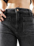 Фото #3 товара Wrangler flared jeans in washed black with front pockets
