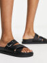 Фото #4 товара schuh Tamara cross strap flat sandals in black