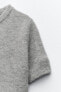 Short sleeve knit sweater