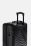 Rigid carry-on suitcase