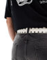 ASOS DESIGN faux leather belt with studs and roller buckle in white