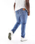 Фото #4 товара Levi's Big & Tall 512 slim taper jeans in mid blue