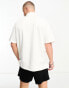 Tommy Jeans vertical stripe linear logo polo shirt in white - WHITE