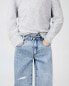 Balloon carrot fit jeans with belt