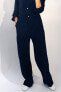 Wide-leg jumpsuit with golden buttons