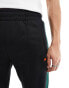 Фото #5 товара ellesse Luxor straight leg track pants in black