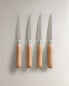 Set of serrated knives with wooden handle