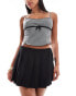 Фото #1 товара ASOS DESIGN tailored mini skort with pleated wrap detail in black