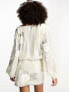 ASOS DESIGN sequin embellished mini dress with floral embellished artwork in white