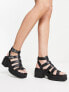 ASOS DESIGN Highway chunky mid heeled sandals in black