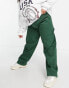 Фото #4 товара ASOS DESIGN Curve mid rise oversized 'skater' jean in racing green with contrast white thread