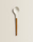 Silicone and wooden spoon