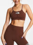 Фото #3 товара The North Face Training seamless performance sports bra in brown Exclusive at ASOS