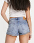 Weekday Fire low rise denim shorts in spring blue