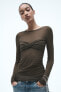 Ribbed semi-sheer gathered top