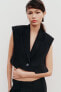 Cropped waistcoat with flaps