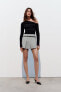 Box pleat skort with belt