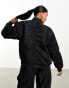 Nike Varsity reversible bomber jacket in black