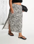 River Island Plus bias cut midi skirt in black polka dot