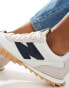 New Balance RC30 trainers with gum sole in white and navy