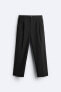 Trousers with contrast double waist