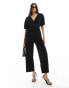 Y.A.S plisse wrap front jumpsuit in black