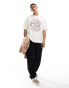 ASOS DESIGN oversized t-shirt in off white with dragon souvenir front print