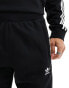 Фото #4 товара adidas Originals three stripe joggers in black