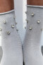 Shimmery socks with rhinestones
