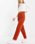 Monki slim leg corduroy trousers in rust