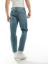 ASOS DESIGN tapered jeans in tinted light wash blue