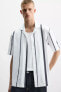 ELASTIC SHIRT WITH STRIPED PRINT