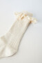 Long lace-trimmed socks