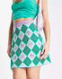 Urban Revivo check print mini skirt in green Зеленый клетчатый, M - EU 38 - фото #1