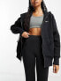 Nike mini swoosh oversized full zip hoodie in black and sail