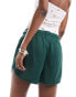 New Balance Athletics mesh shorts in green