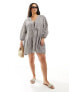 Фото #1 товара Esmee Plus beach tiered smock mini dress with tie front detail in dark brown gingham