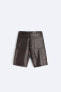 Leather carpenter bermuda shorts with pocket