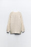 Cable-knit sweater