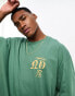 Фото #2 товара ASOS DESIGN oversized t-shirt in green with gothic text chest print