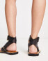 ASOS DESIGN Foxy leather studded toe loop flat sandals in black