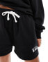 Kaiia motif sweat shorts co-ord in black