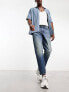 Фото #1 товара ASOS DESIGN skater jeans in dark wash blue with tint