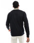 Fred Perry long sleeve relaxed fit polo in black with embroidered logo