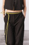 Zw collection trousers with tabs at the hems