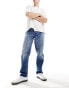 Lee Oscar relaxed tapered fit distressed jeans in mid vintage wash