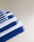 Cotton bath towel with blue stripes