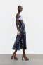 Pleated midi skirt with print