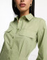 ASOS DESIGN utility mini shirt dress with nipped in waist and pocket detail in khaki