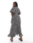 Vero Moda Curve wrap front maxi dress in black abstract print